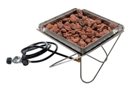 Recalled Takibi Propane Insert (model ST-332-US) with reddish brown lava rocks inside the Snow Peak's Pack & Carry Fireplace
