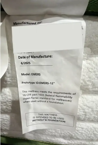 "Prototype ID: " and the manufacture date "6/2025" are printed on a sewn-in white label located on one side of the mattress