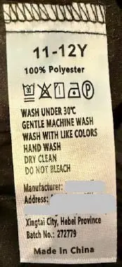 "Batch No.: 272779" and the size are printed on a sewn-in seam label