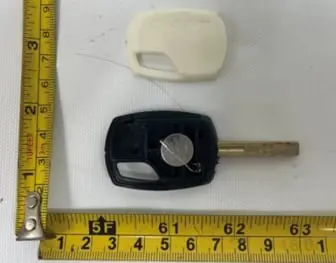 Recalled LED-Light Key with Accessible Button-Cell Battery